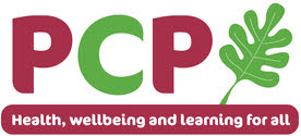 Logo : The letters PCP in green and wine with a green leaf and strapline Health, wellbeing and learning for all